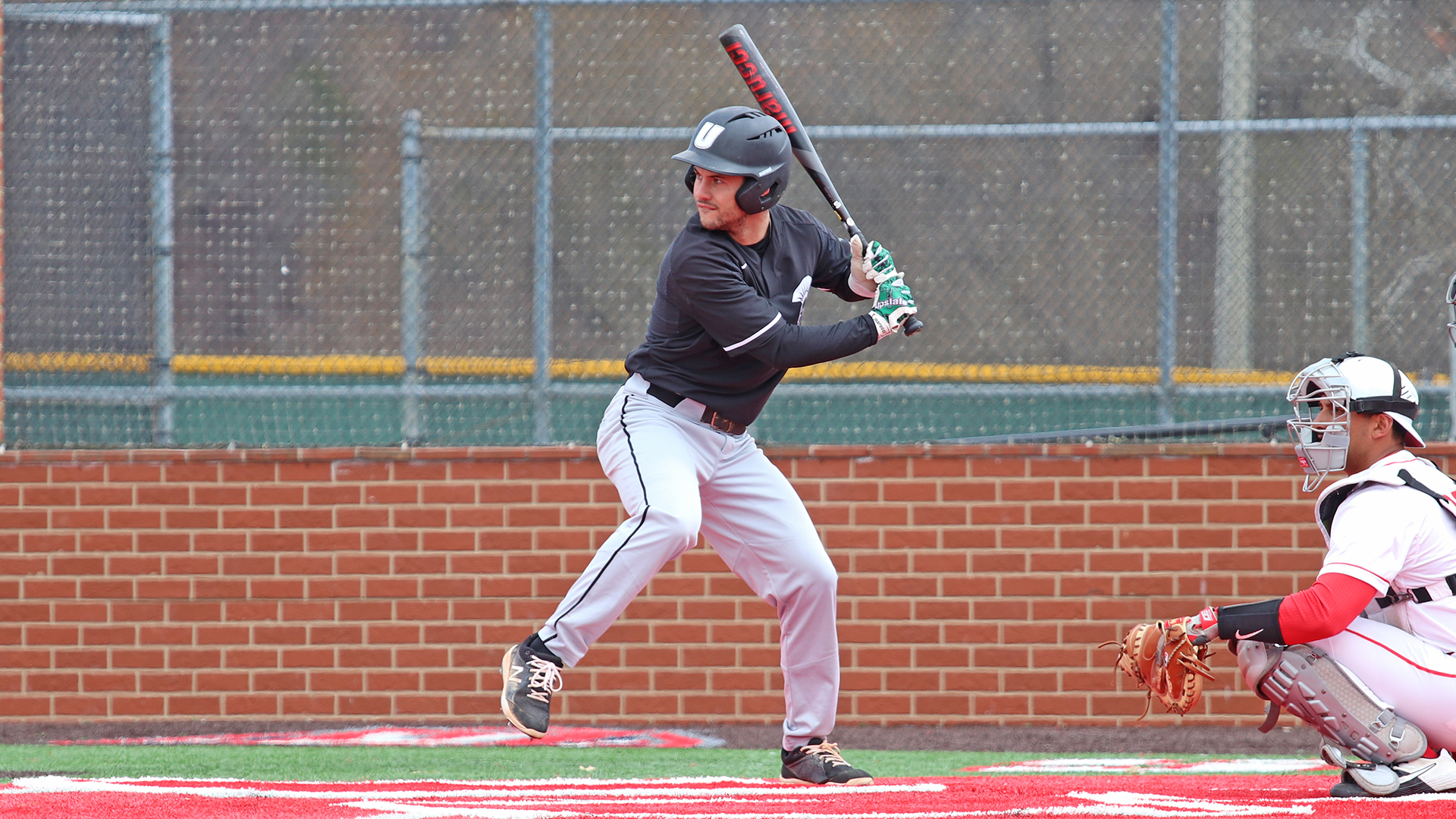 USC Upstate's Grant Sherrod swings at a pitch